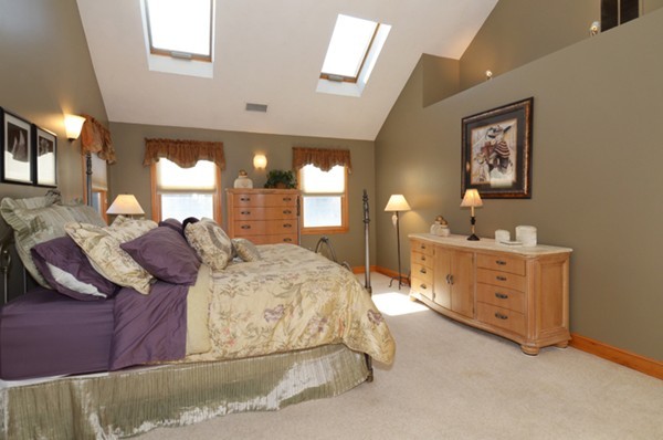 201 Andover Street Georgetown, MA 01833 - Photo 23 of 30 a spacious bedroom with a bed and window