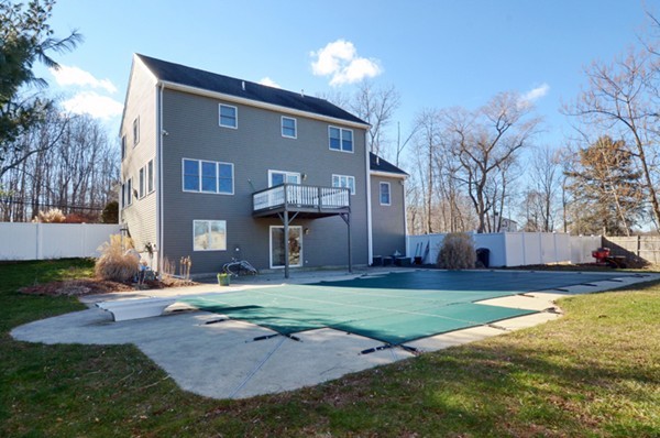 201 Andover Street Georgetown, MA 01833 - Photo 4 of 30 a view of a house with a yard and tree s