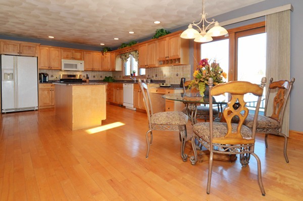 201 Andover Street Georgetown, MA 01833 - Photo 9 of 30 a view of a dining room with furniture window and wooden floor