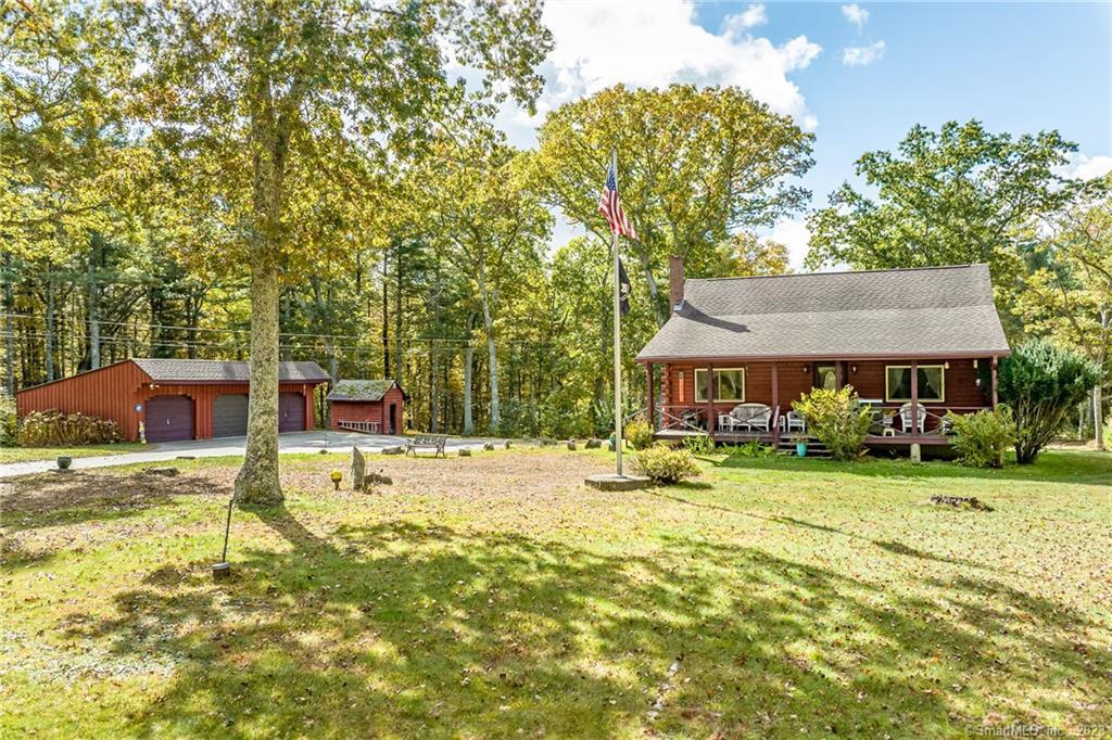779 Bailey Hill Road Killingly, CT 06241 - Photo 1 of 1 a view of a house with pool and sitting area