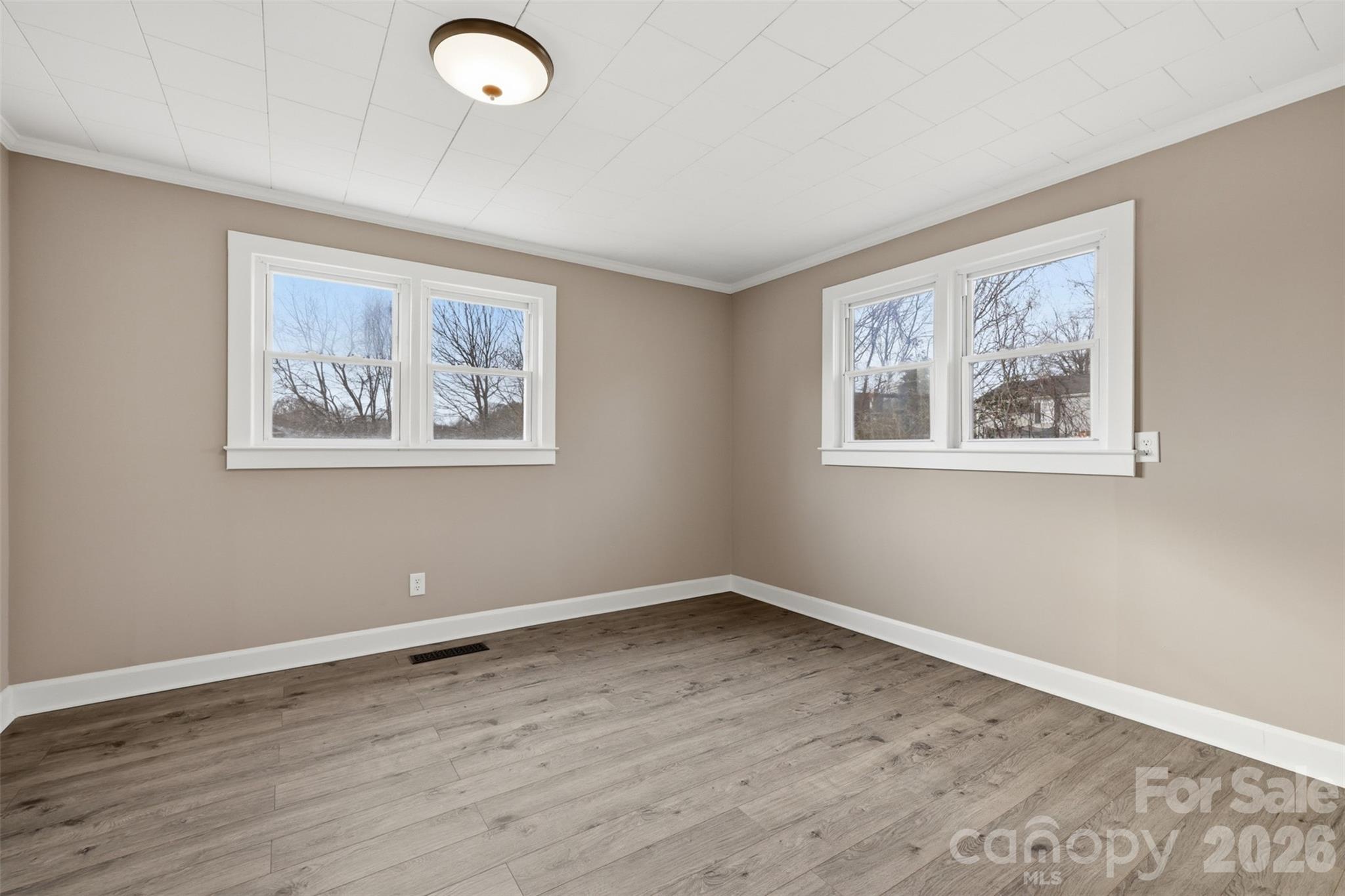 100 Boston Road Taylorsville, NC 28681 - Photo 17 of 41 a view of a room with wooden floor and window