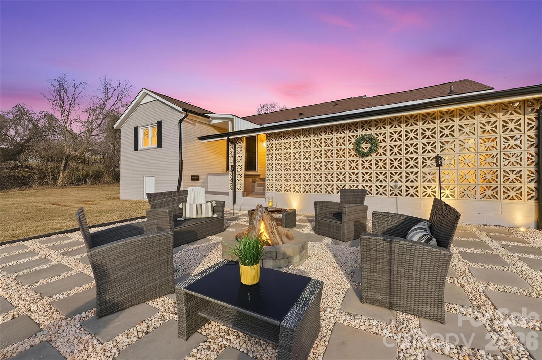 100 Boston Road Taylorsville, NC 28681 - Photo 2 of 41 a front view of a house with outdoor seating