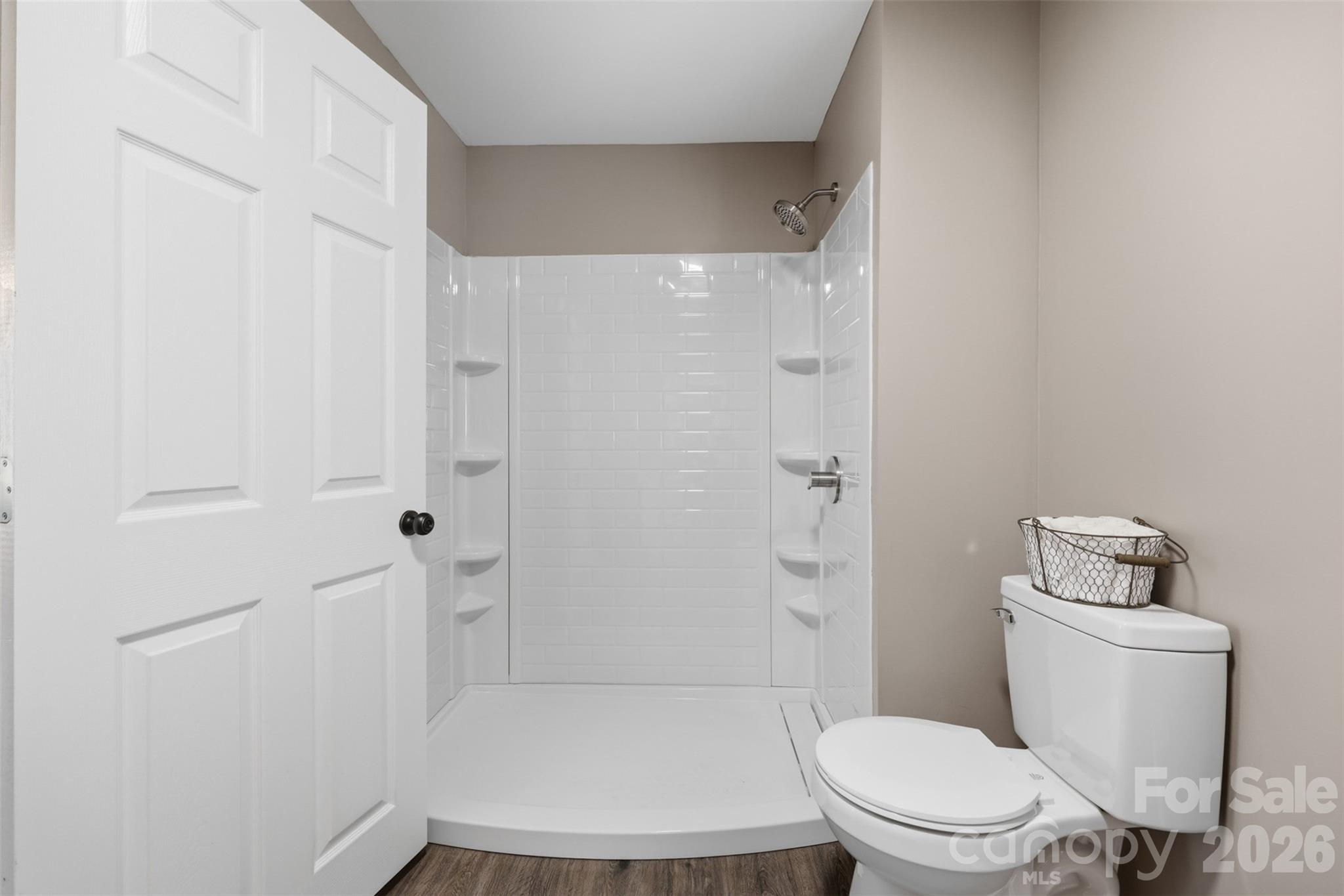 100 Boston Road Taylorsville, NC 28681 - Photo 23 of 41 a white toilet sitting next to a bathroom