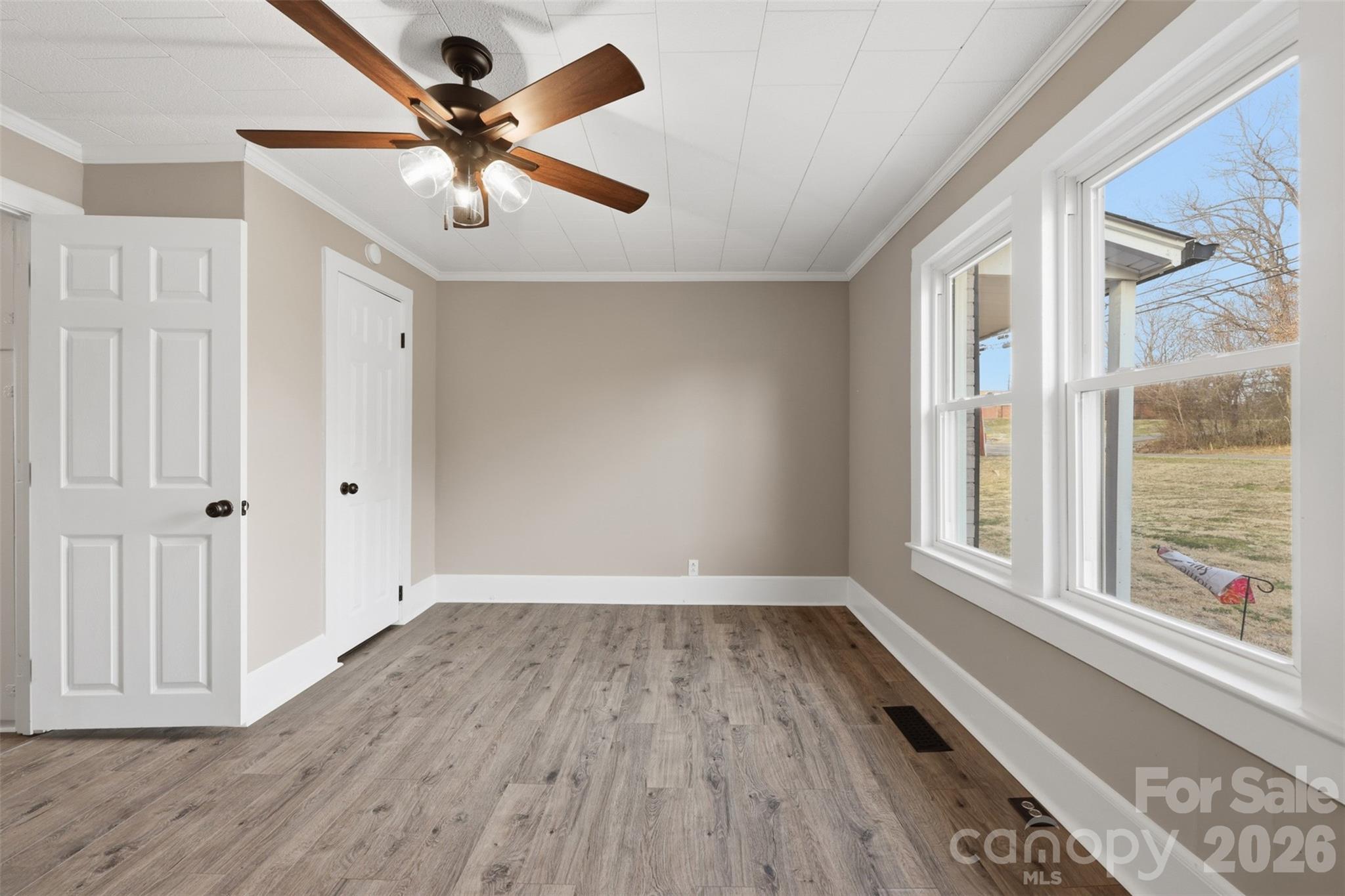 100 Boston Road Taylorsville, NC 28681 - Photo 25 of 41 wooden floor in an empty room with a window