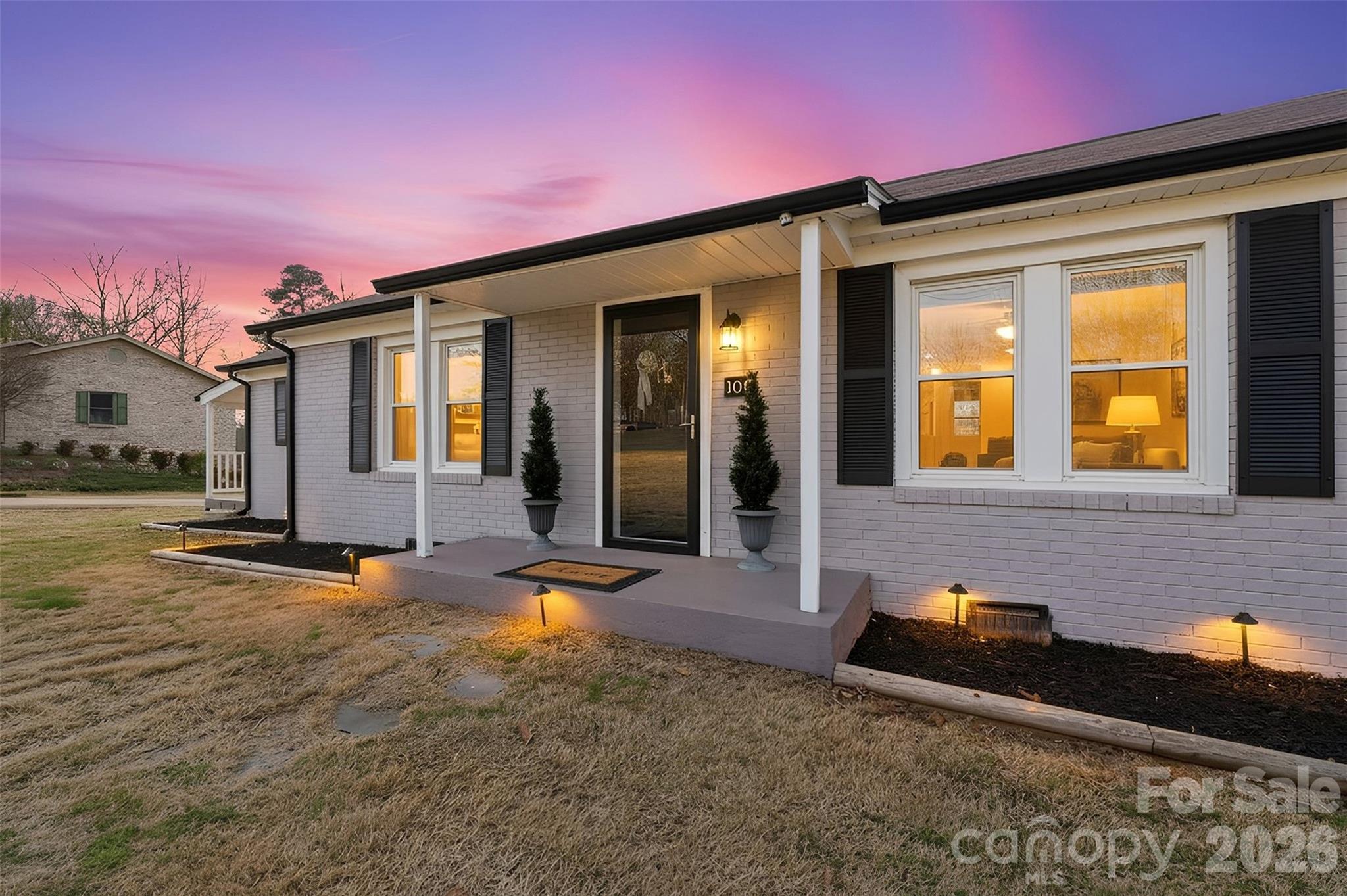 100 Boston Road Taylorsville, NC 28681 - Photo 3 of 41 a front view of a house with a yard