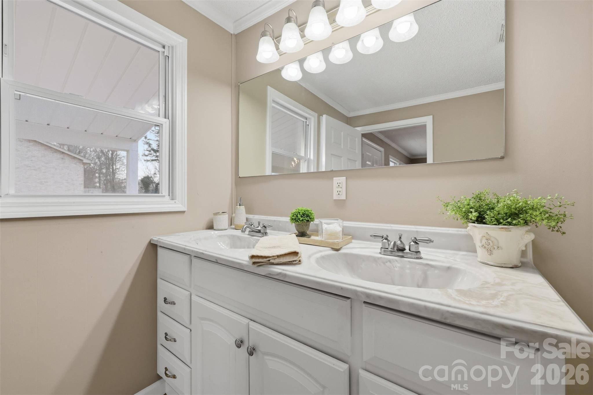 100 Boston Road Taylorsville, NC 28681 - Photo 31 of 41 a bathroom with a sink and a mirror