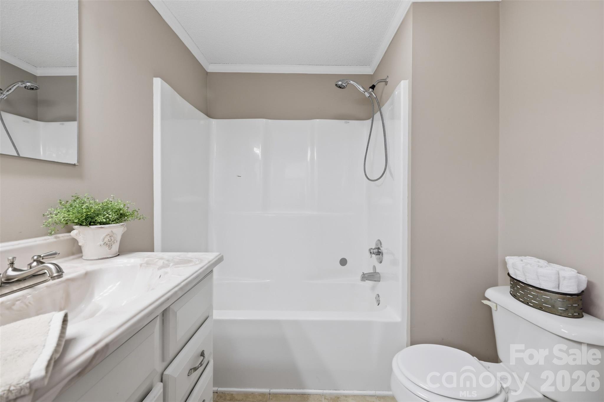 100 Boston Road Taylorsville, NC 28681 - Photo 32 of 41 a bathroom with a granite countertop sink toilet and shower