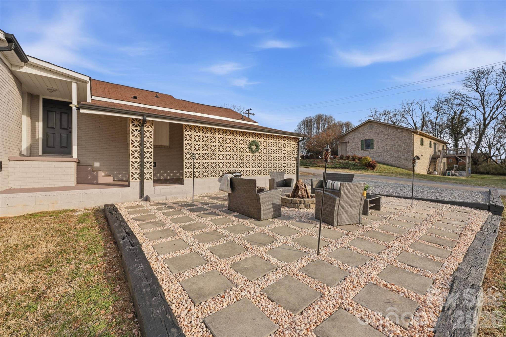 100 Boston Road Taylorsville, NC 28681 - Photo 8 of 41 a view of a terrace with chairs