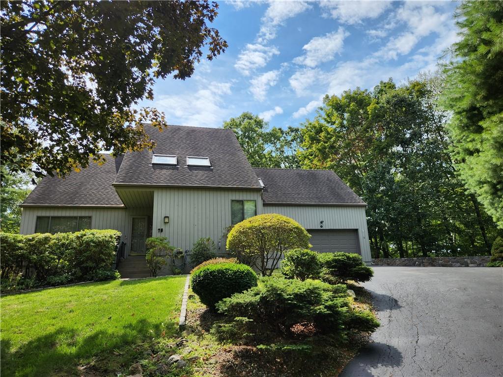 78 Mitchell Road Somers, NY 10589 - Photo 1 of 1 a front view of a house with garden