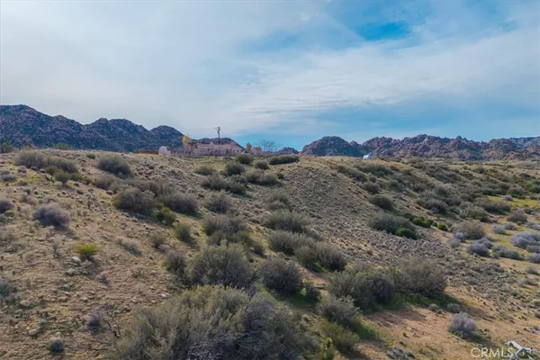 a view of mountains and valleys