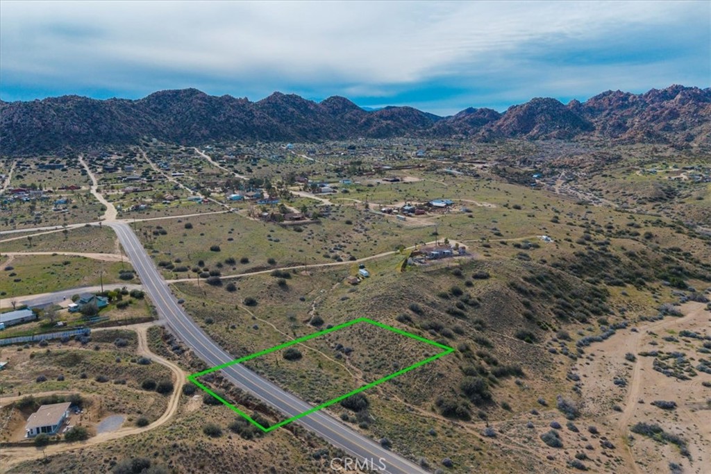 5190 Pioneertown Road Pioneertown, CA 92268 - Photo 26 of 30 a view of a lot of trees and covered with wooden fence