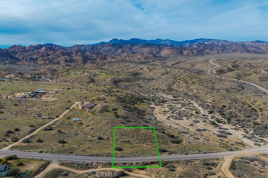 5190 Pioneertown Road Pioneertown, CA 92268 - Photo 4 of 30 a view of a yard with an outdoor space