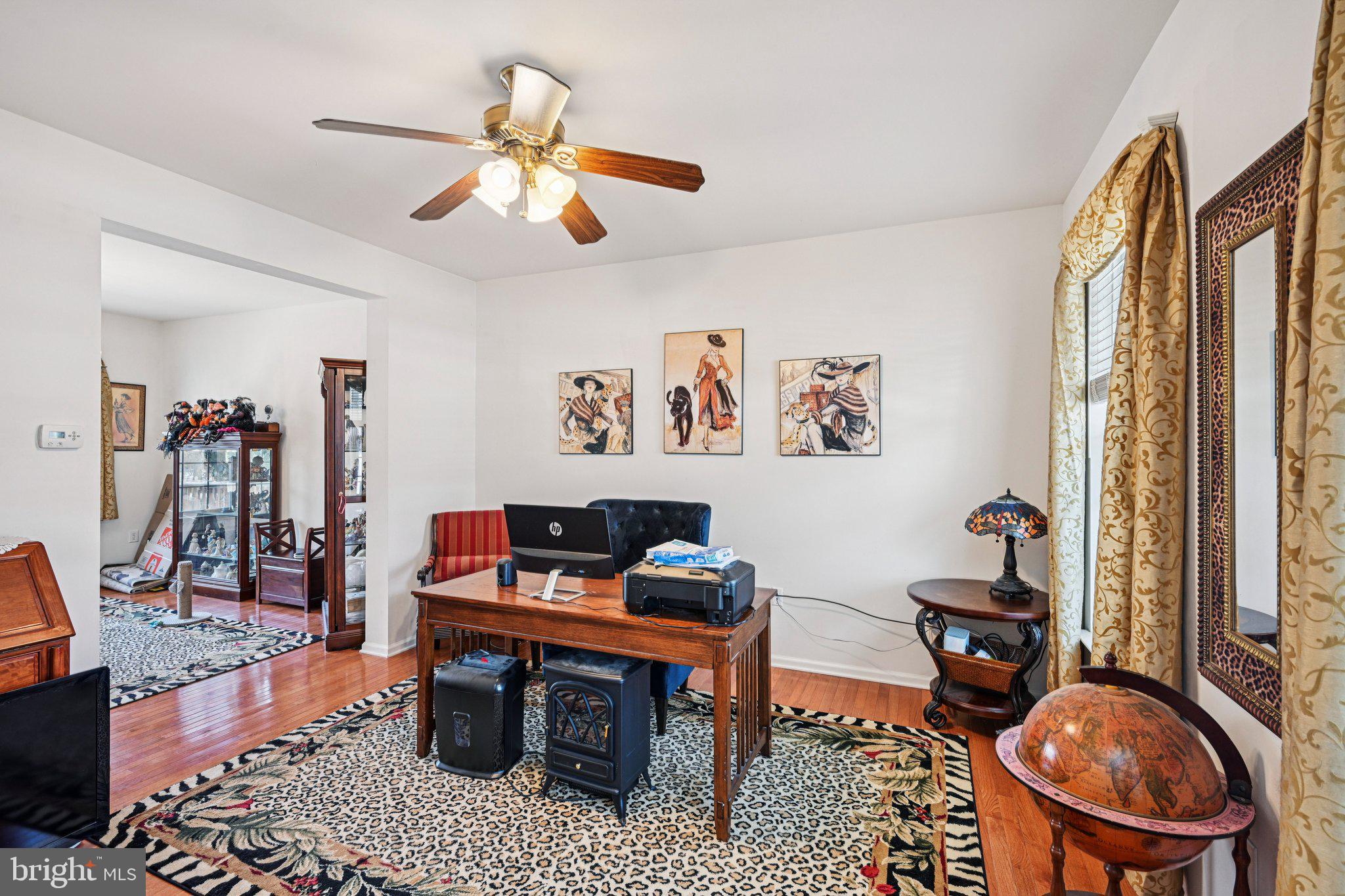 207 Waterford Road Egg Harbor Township, NJ 08234 - Photo 12 of 47 a living room with furniture and a window