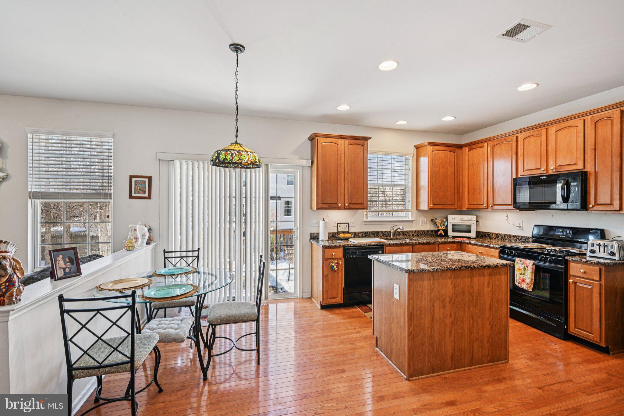 207 Waterford Road Egg Harbor Township, NJ 08234 - Photo 20 of 47 a kitchen with stainless steel appliances granite countertop sink stove top oven and refrigerator