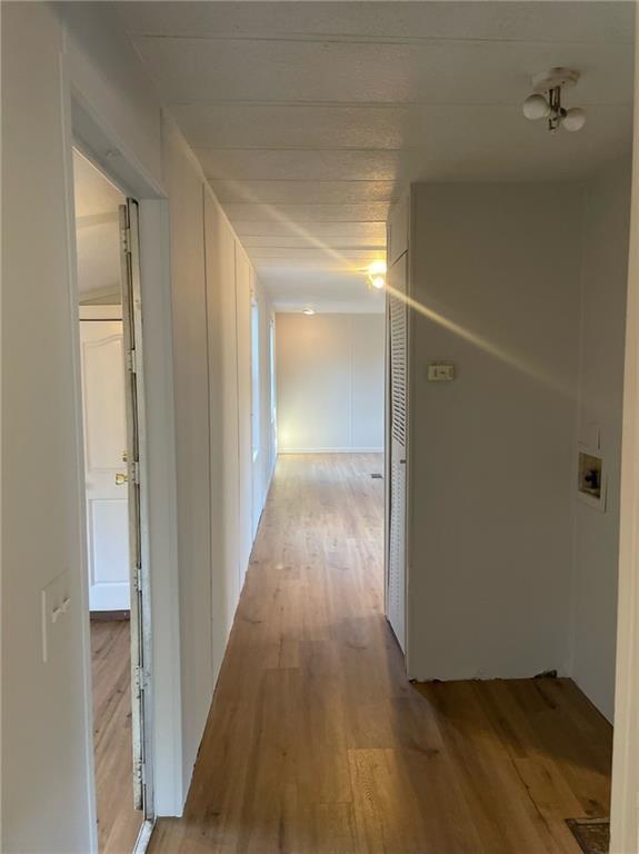 121 Bear Ridge Road Dahlonega, GA 30533 - Photo 14 of 14 a view of a hallway with wooden floor