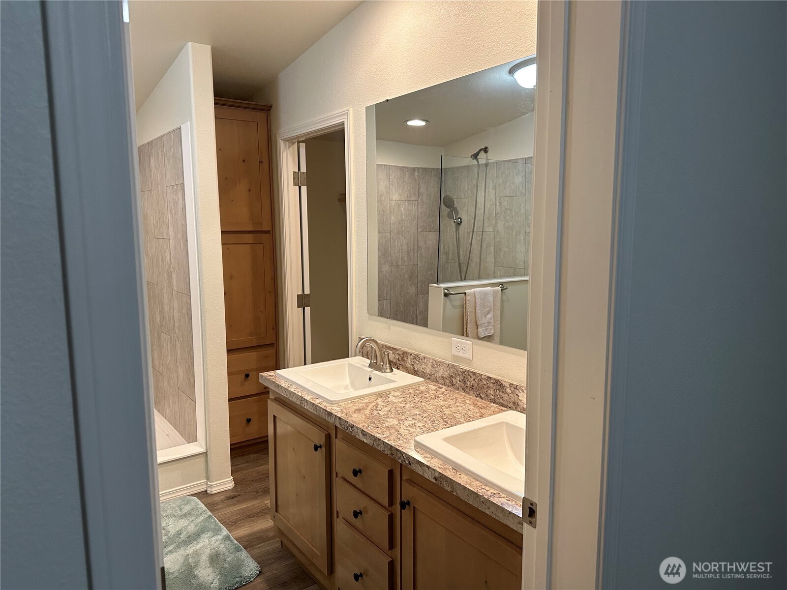 206 Mossyrock Road West Mossyrock, WA 98564 - Photo 12 of 24 a bathroom with a granite countertop sink and a mirror