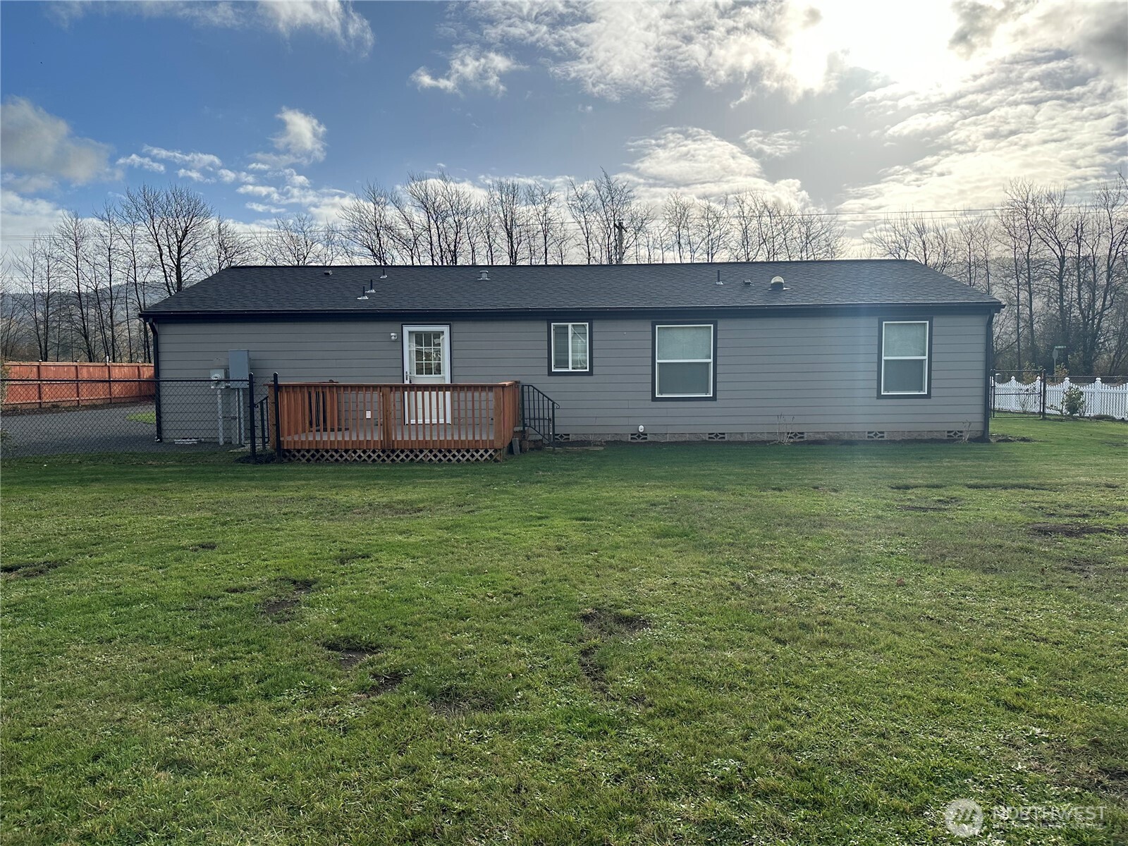 206 Mossyrock Road West Mossyrock, WA 98564 - Photo 19 of 24 a view of a backyard with a large tree