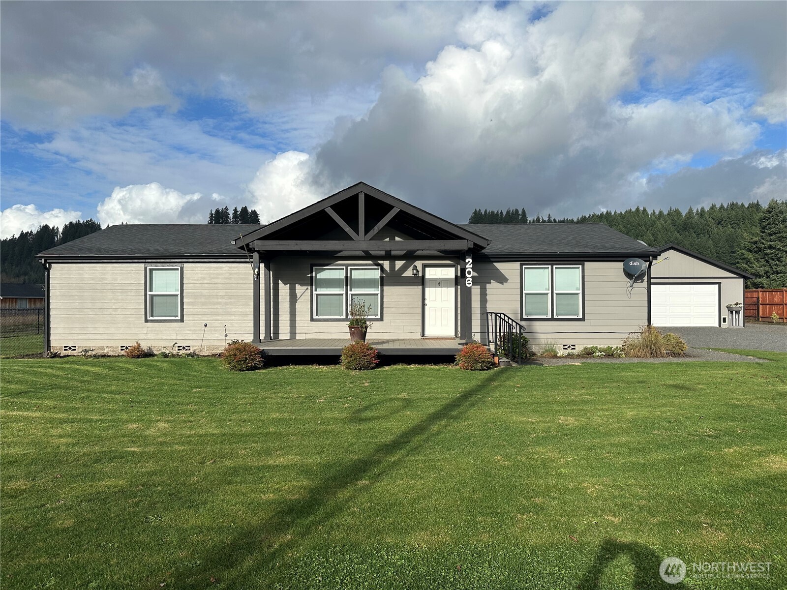 206 Mossyrock Road West Mossyrock, WA 98564 - Photo 24 of 24 a front view of a house with a garden