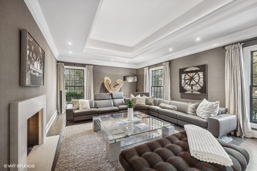 89 North Indian Hill Road Winnetka, IL 60093 - Photo 12 of 91 a living room with furniture fireplace and a large window