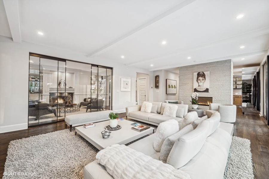 89 North Indian Hill Road Winnetka, IL 60093 - Photo 19 of 91 a living room with furniture flat screen tv and a table