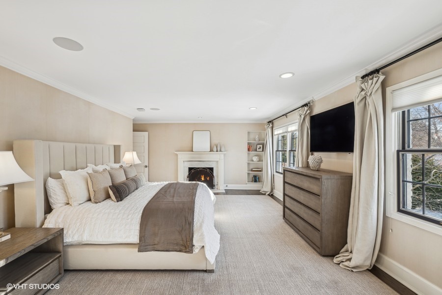 89 North Indian Hill Road Winnetka, IL 60093 - Photo 37 of 91 a living room with furniture a flat screen tv and a fireplace