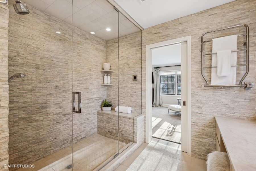 89 North Indian Hill Road Winnetka, IL 60093 - Photo 42 of 91 a bathroom with a glass door shower and a sink