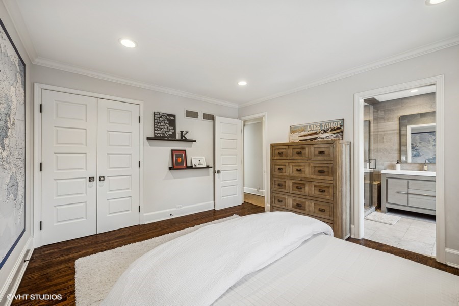 89 North Indian Hill Road Winnetka, IL 60093 - Photo 44 of 91 a bedroom with a bed and a mirror