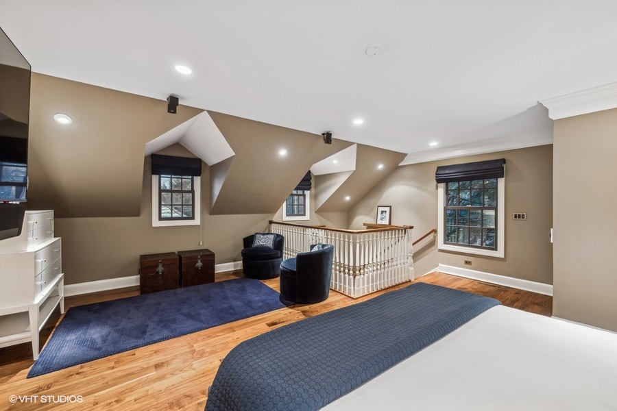 89 North Indian Hill Road Winnetka, IL 60093 - Photo 71 of 91 a bedroom with furniture and a wooden floor