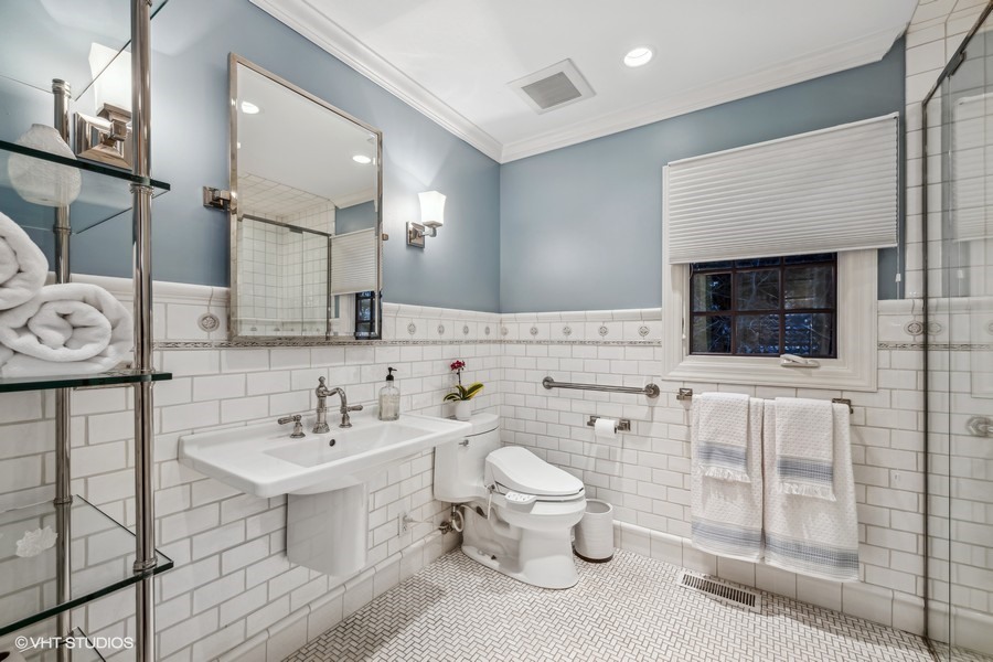 89 North Indian Hill Road Winnetka, IL 60093 - Photo 72 of 91 a bathroom with a double vanity sink mirror and toilet