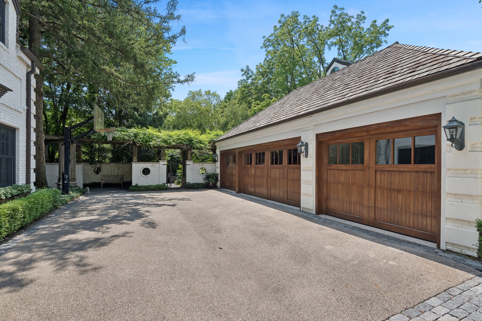 89 North Indian Hill Road Winnetka, IL 60093 - Photo 9 of 91 a front view of a house with a garage