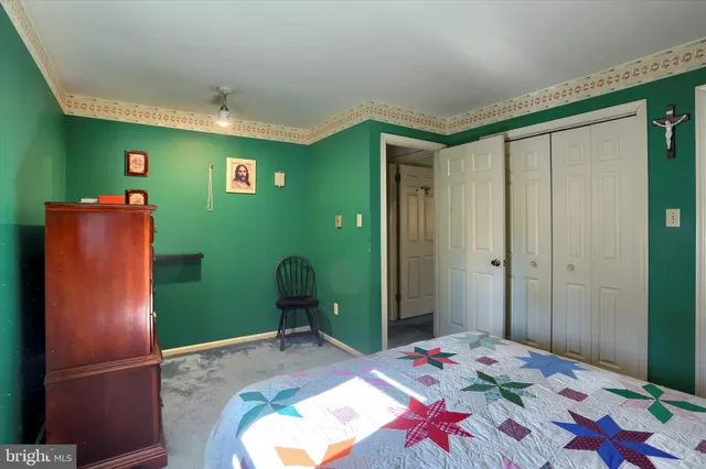 a view of an entryway with front door