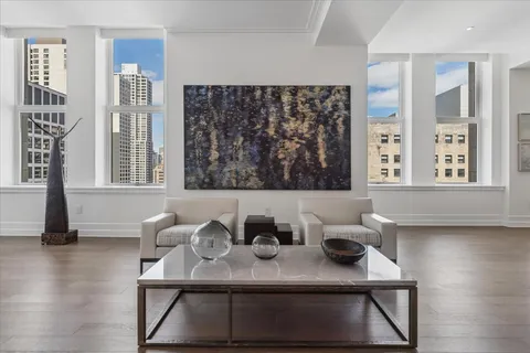 a very nice looking room with a table and chairs