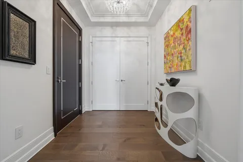 a bathroom with a granite countertop sink and a shower