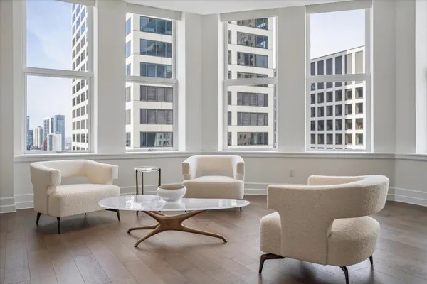 a living room with furniture and a window