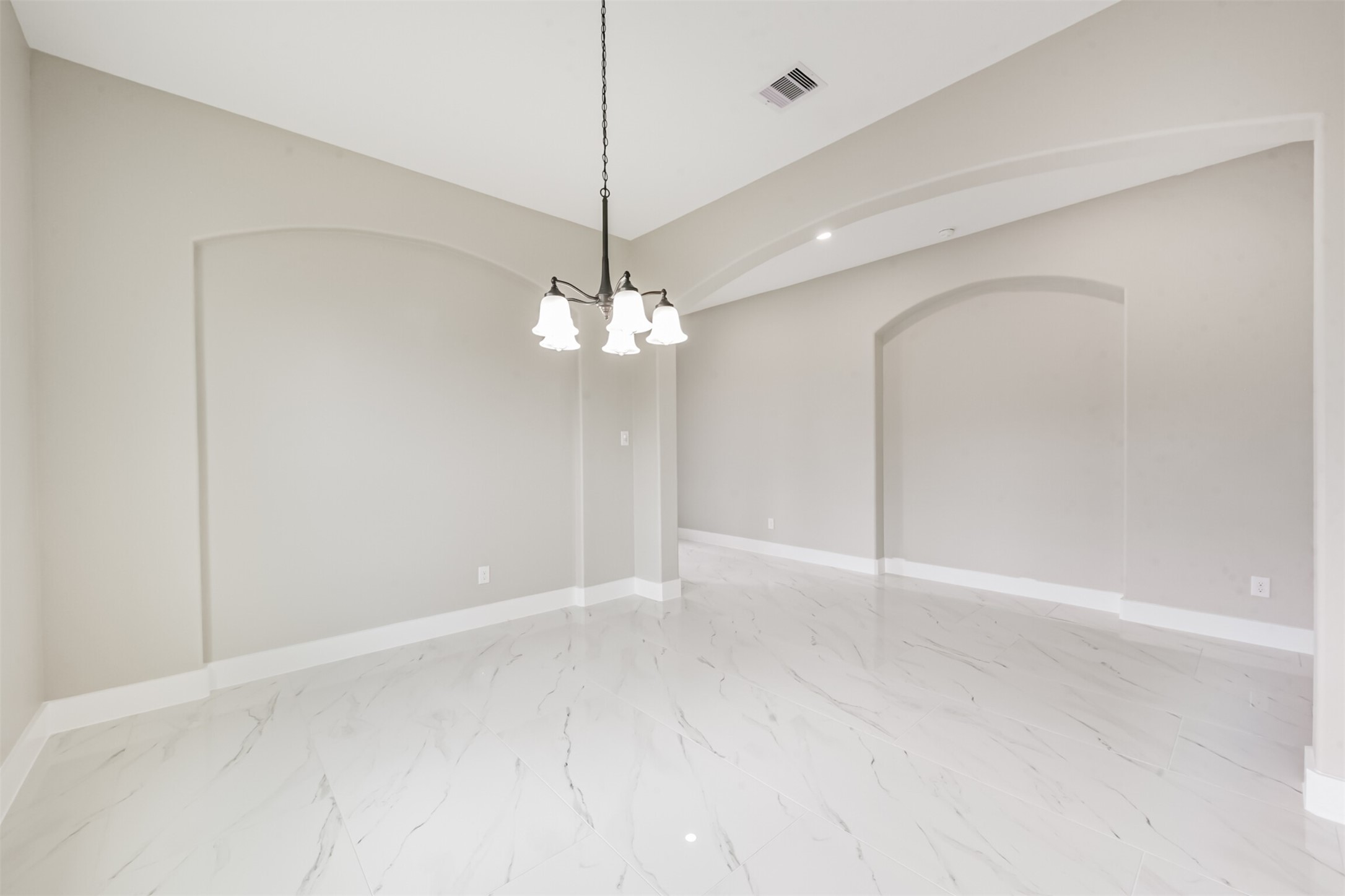 2803 Lancaster Lane Pasadena, TX 77506 - Photo 21 of 45 a view of an empty room with a chandelier fan