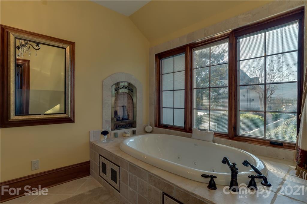 383 Silver Ridge Road Mill Spring, NC 28756 - Photo 22 of 46 a room with pool table and windows