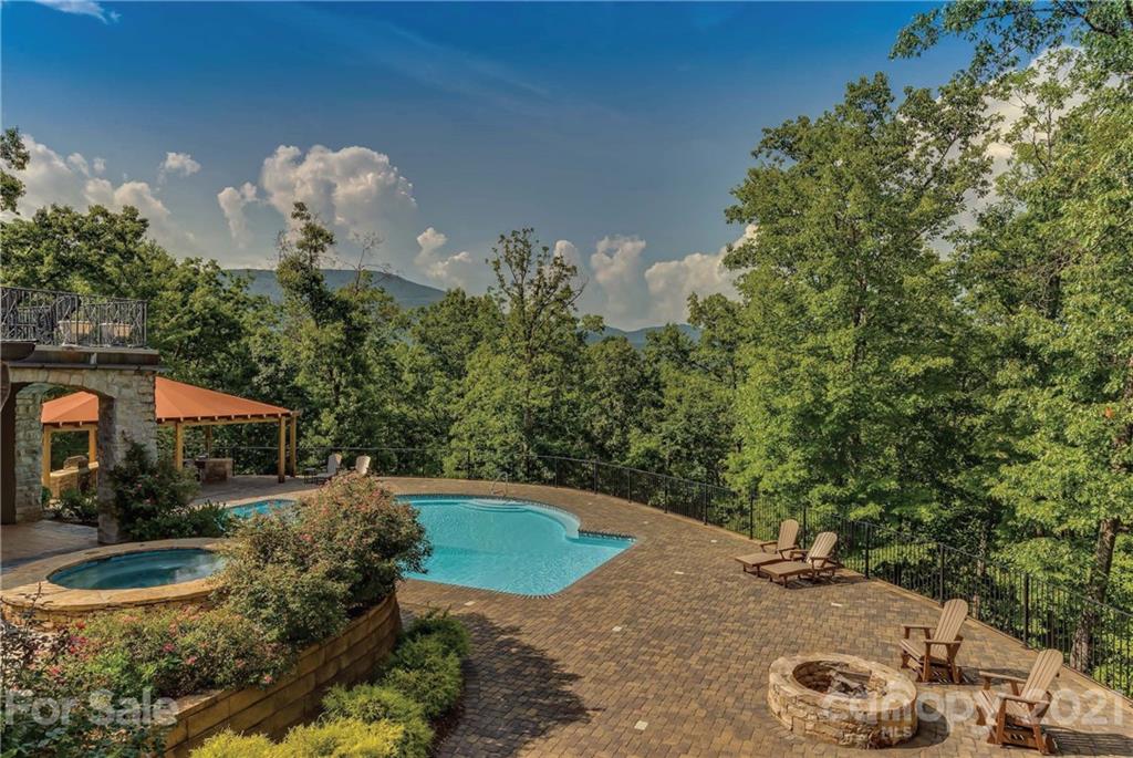 383 Silver Ridge Road Mill Spring, NC 28756 - Photo 43 of 46 a view of a house with a yard