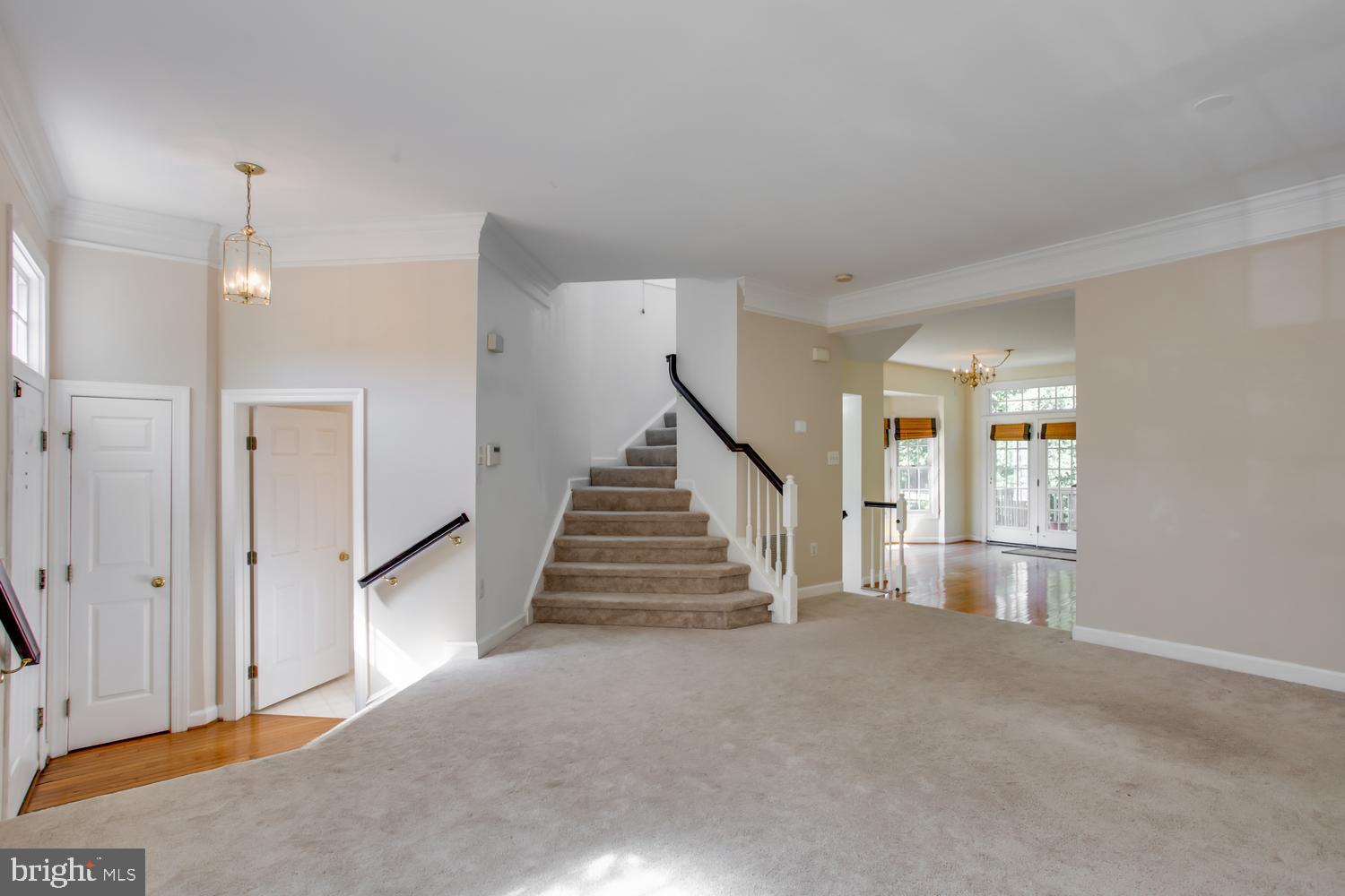 6248 Levi Court Springfield, VA 22150 - Photo 4 of 51 Inviting entryway with elegant staircase.