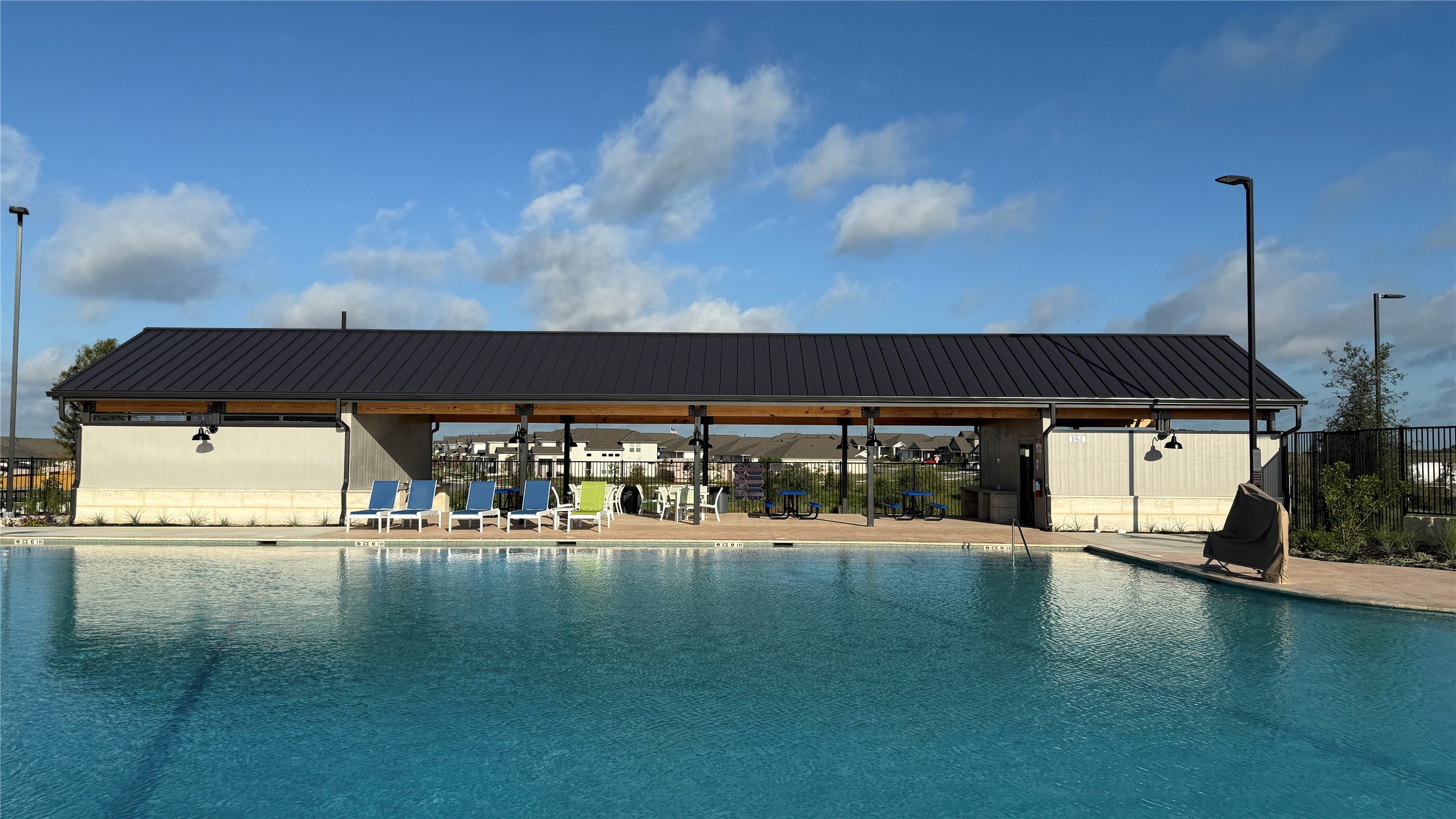 461 Young Street Buda, TX 78610 - Photo 28 of 32 a view of a swimming pool and an outdoor seating