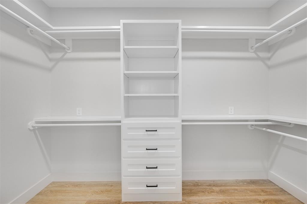 406 Private Road Brookston, TX 75421 - Photo 21 of 37 a view of an empty walk in closet