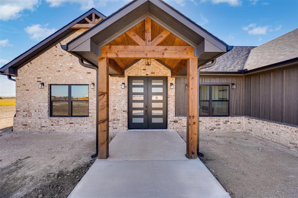 406 Private Road Brookston, TX 75421 - Photo 5 of 37 a front view of a house