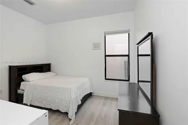 a view of closet area with empty racks