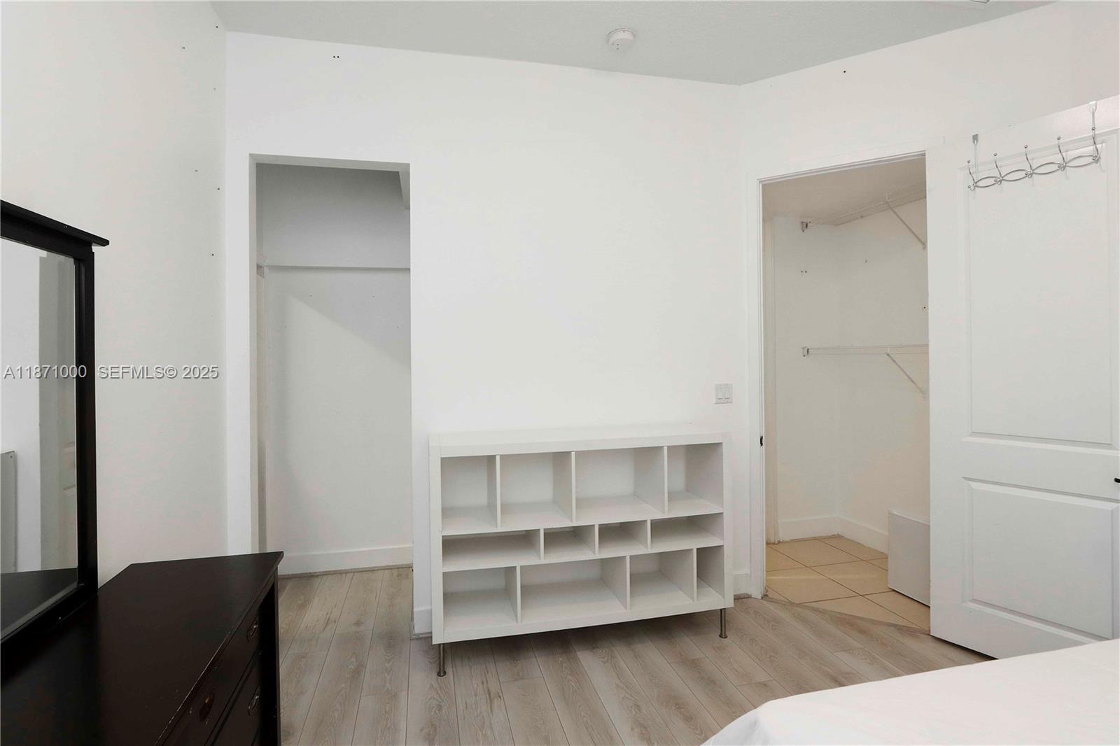 3293 West 98th Place Hialeah, FL 33018 - Photo 12 of 49 a view of closet area with empty racks