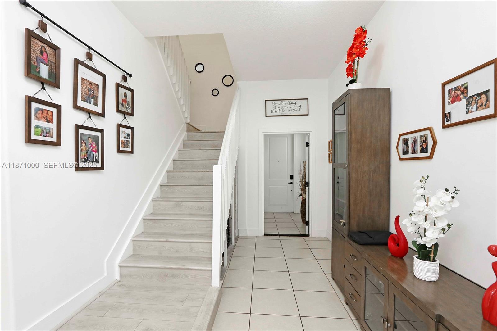3293 West 98th Place Hialeah, FL 33018 - Photo 14 of 49 a view of an entryway with wooden floor