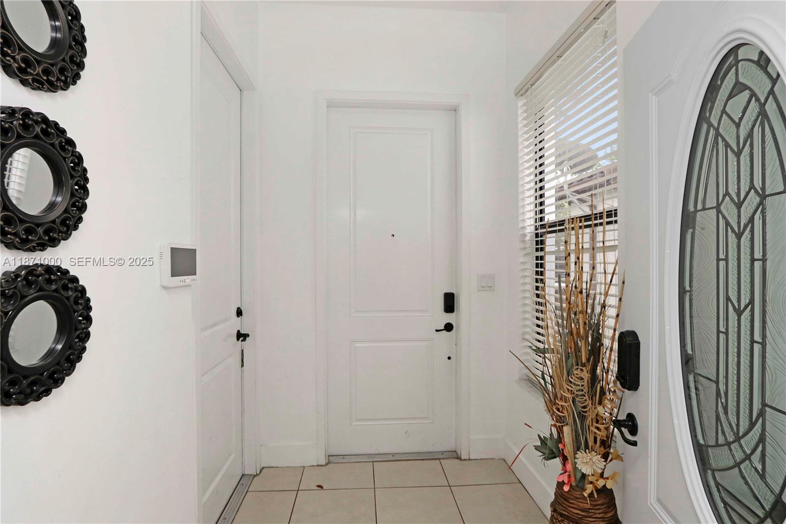 3293 West 98th Place Hialeah, FL 33018 - Photo 2 of 49 a bathroom with a bathtub and shower