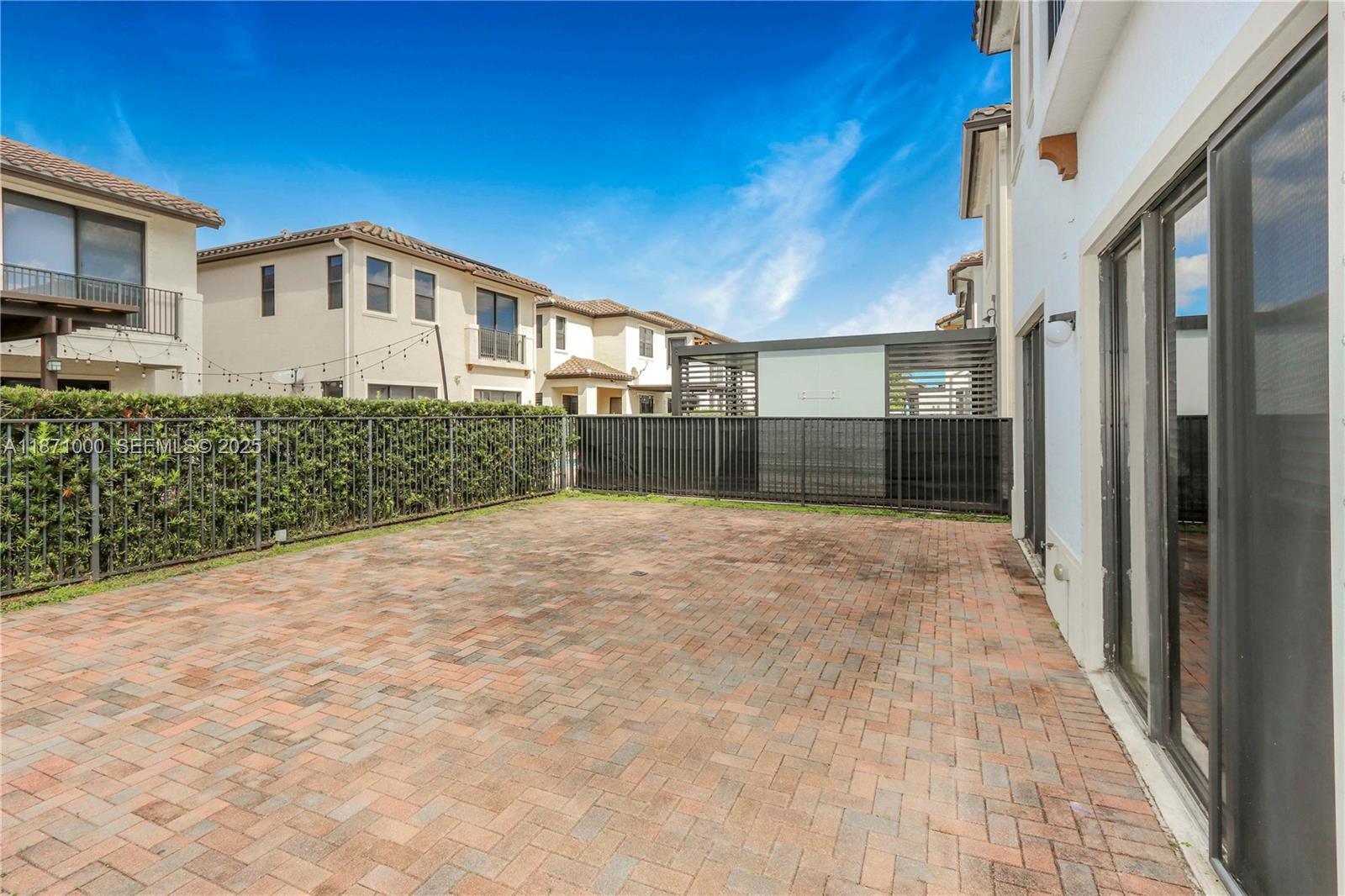 3293 West 98th Place Hialeah, FL 33018 - Photo 29 of 49 a view of a house with a backyard