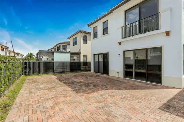 a house with yard in front of it