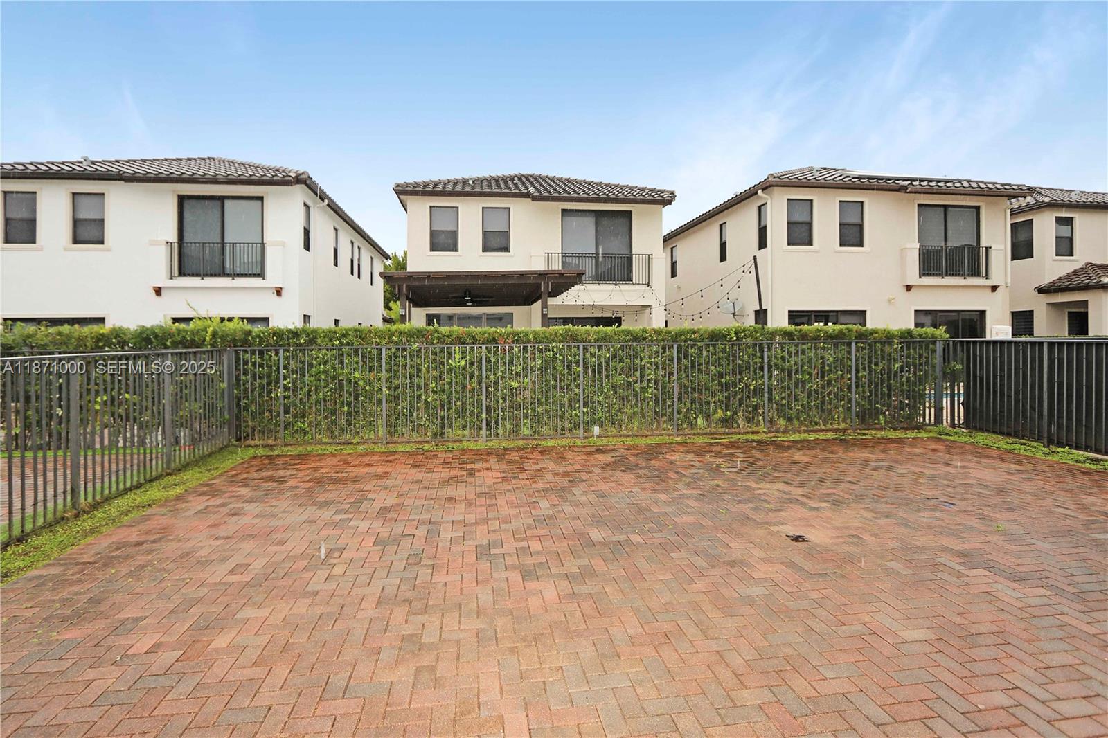 3293 West 98th Place Hialeah, FL 33018 - Photo 31 of 49 a front view of a house with garden