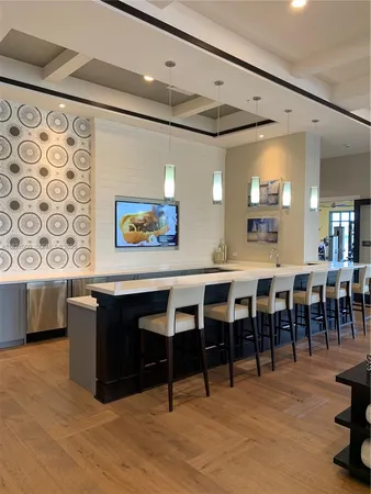 a group of chairs sitting in kitchen and dining room