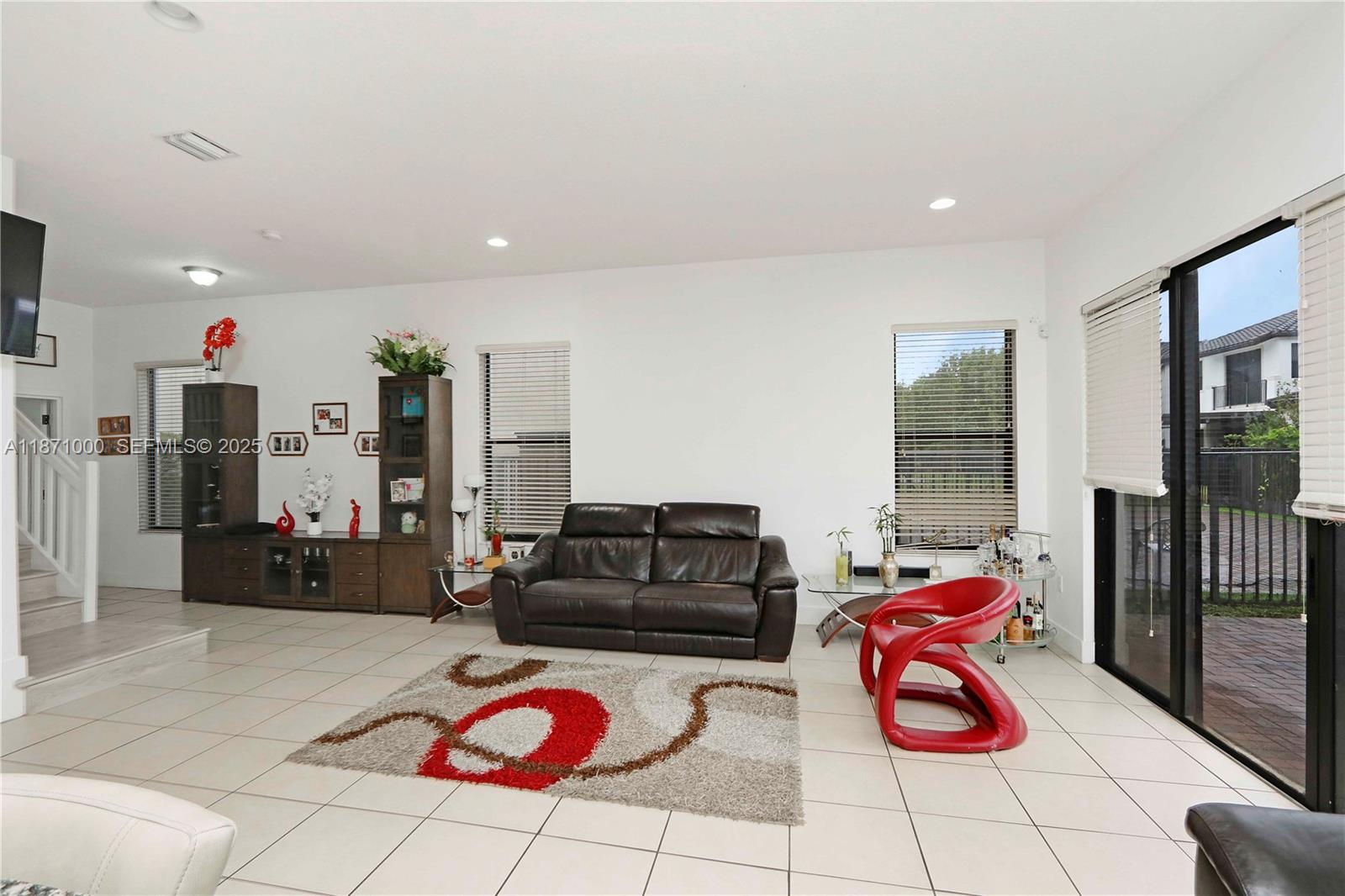 3293 West 98th Place Hialeah, FL 33018 - Photo 7 of 49 a living room with furniture